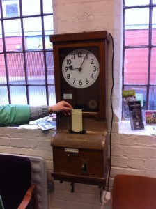 Wooden clocking in clock in reception