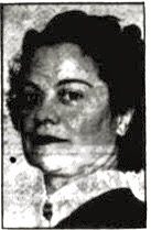 Black and white newspaper image of a middle aged woman