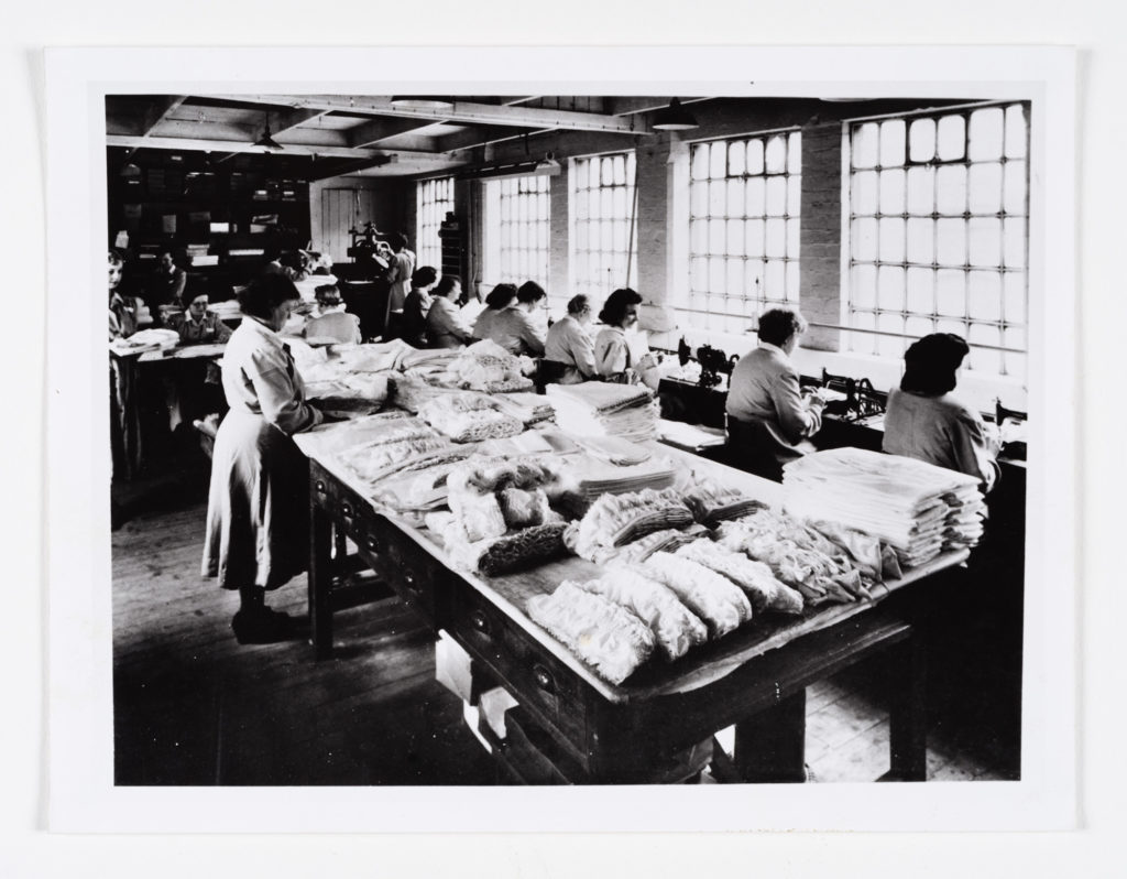 Black and white Photo of women working in the shroud room