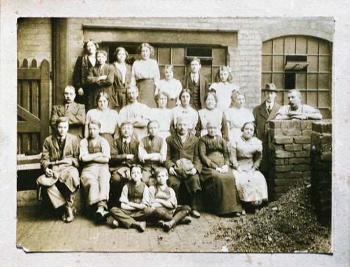 black and white image of coffin works' workforce