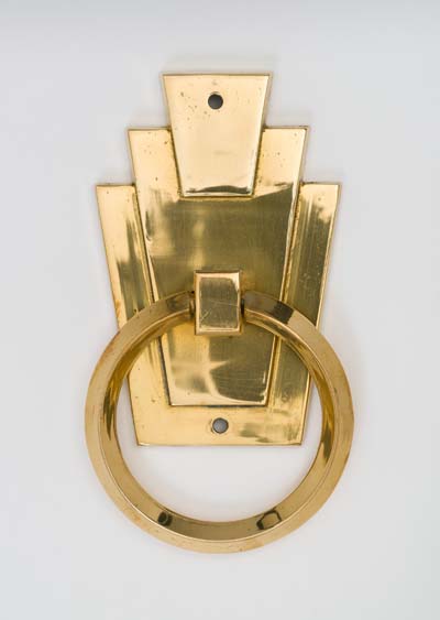 Brass ring handle with art deco style attachment