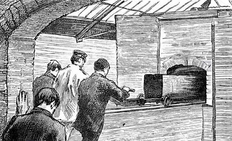Black and white illustration of a coffin entering furnace. four figures with their back to us in foreground.