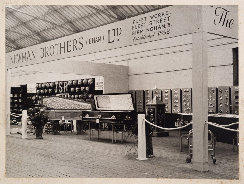 Black and white photo of Newman Brothers trade show stand