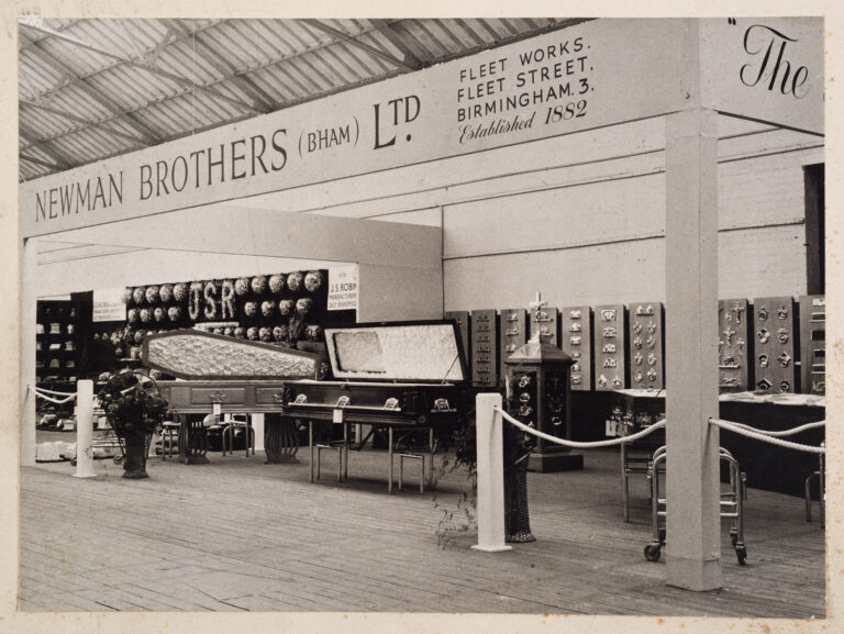 Black and white photo of Newman Brothers trade show stand