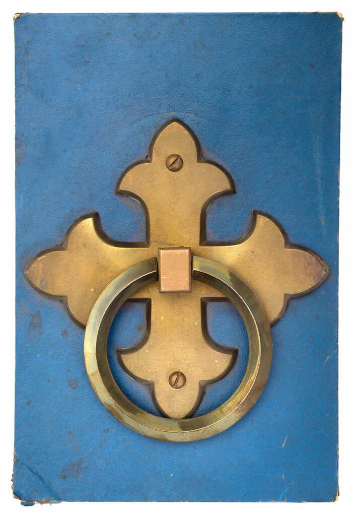 brass ring handle on blue background