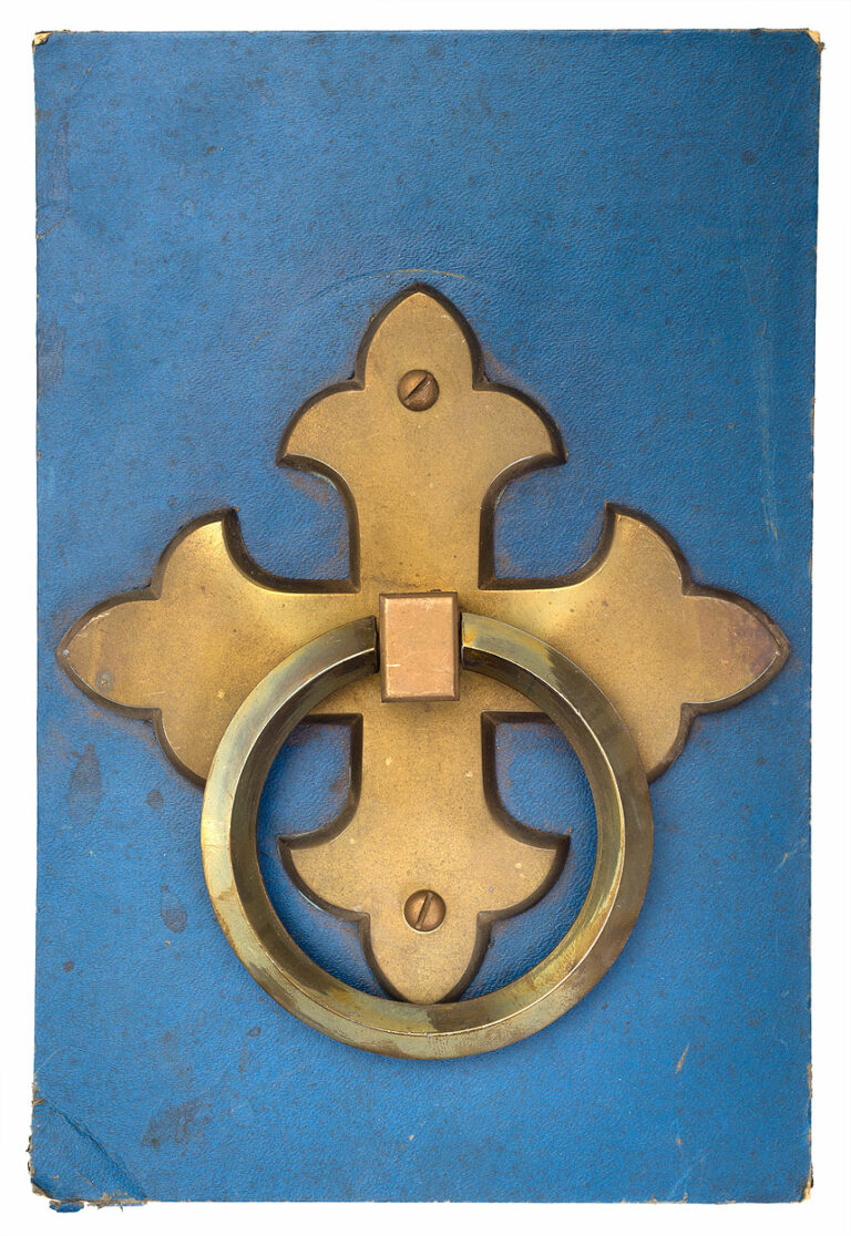 brass ring handle on blue background