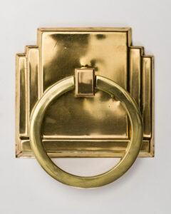 Shiny brass art deco ring handle with rectangular fixing