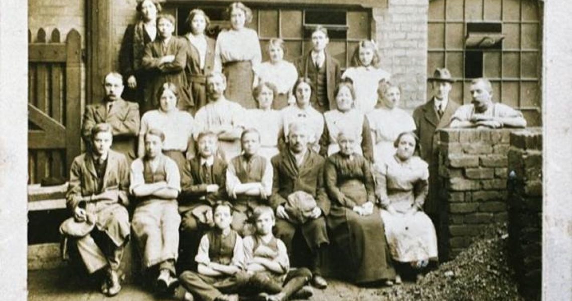 black and white image of coffin works' workforce