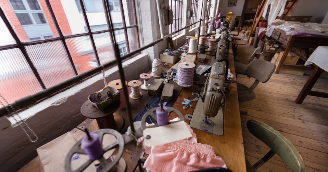 The Shroud Room, sewing machines in front of windows